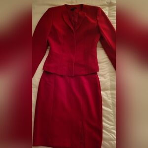 Ann Taylor skirt suite 2 pieces red size. Blazer is 0. Skirt size 4